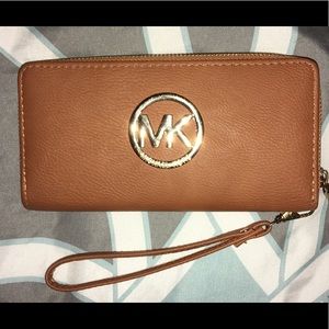 Brown leather MK zip wallet